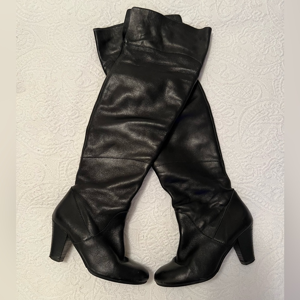 Over the knee black leather boots